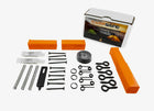 An array of essential accessories for the Fith Ops Perimeter Trip alarm laid out on a white background, including multiple screws, springs, trip wire, extra pins and small gun oil with package in background - Thumbnail Image