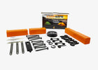 An array of essential accessories for the Fith Ops Perimeter Trip alarm laid out on a white background, including multiple screws, springs, trip wire, extra pins and small gun oil and orange plastic case for quick and easy packing! - Thumbnail Image
