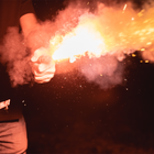 Person Using the Gen4 2-in-1 Rescue Tool as an Emergency Signal Device, straight from the hand - Thumbnail Image